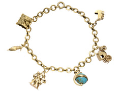 thumbnail of A vintage c1940 yellow gold charm bracelet with charms depicting a house, an umbrella, a ferris wheel, a blue enamel globe, a car, and a baby carriage. Shown on white background.