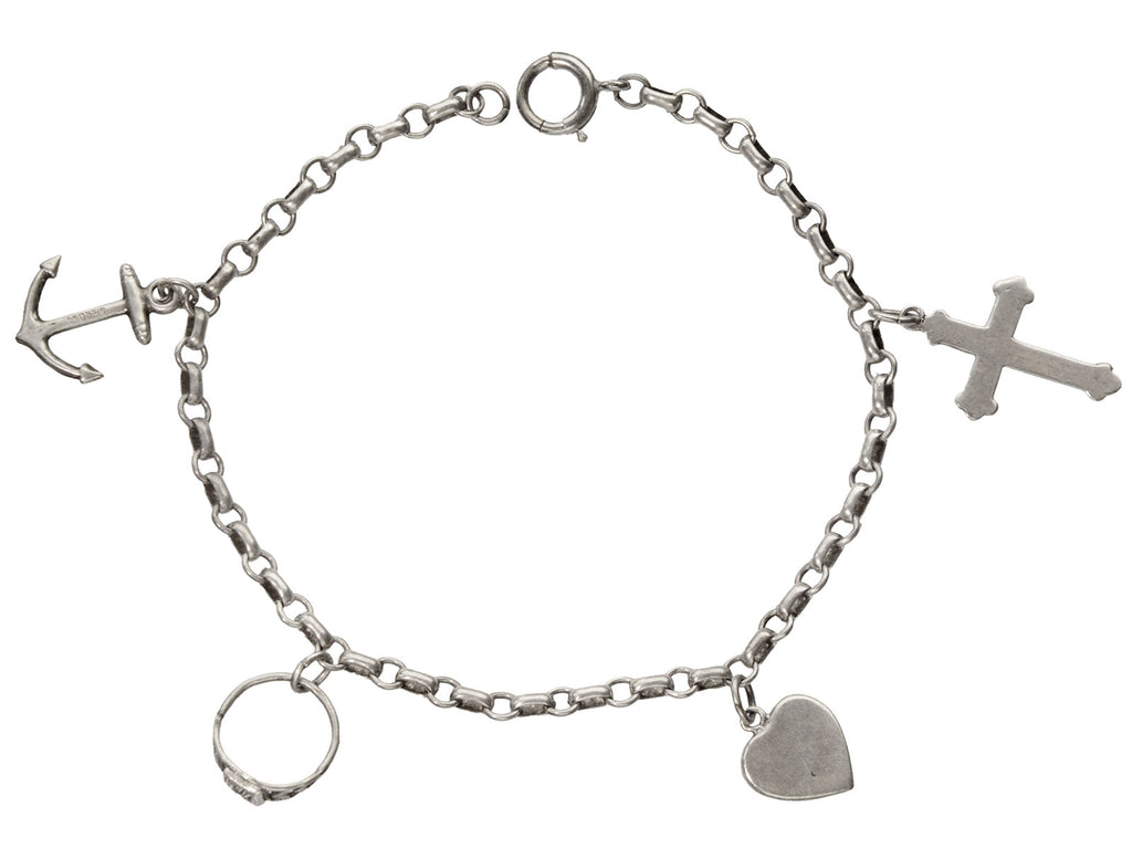 c1930 Vintage Silver Charm Bracelet with 4 Charms: an Anchor, a Baby Ring, a Heart, and a Cross. Shown on white background.