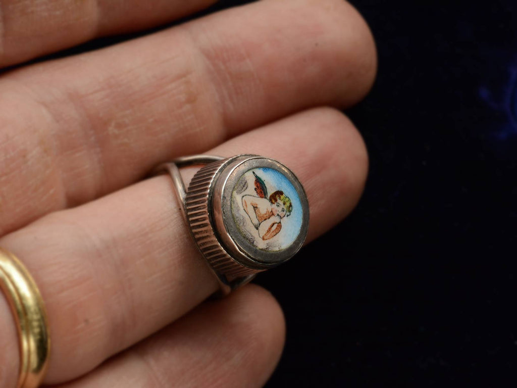 c1900 Silver and Enamel Cherub Ring (on finger for scale)