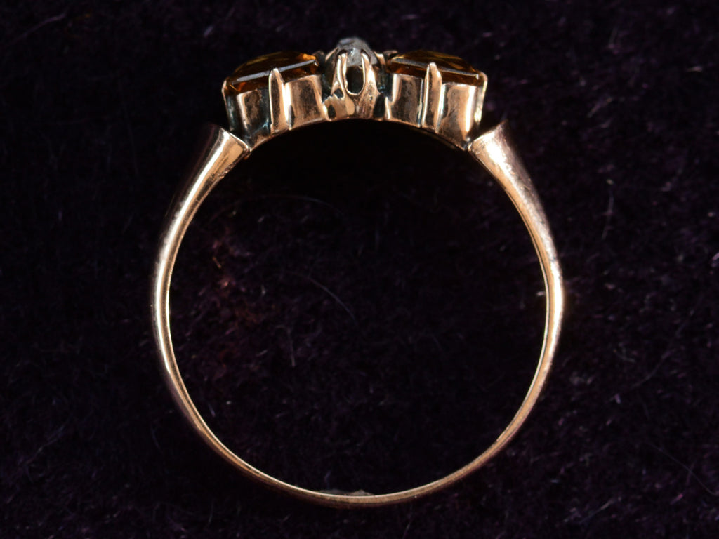 Side profile view of c1900 Citrine & Diamond Ring in Rosy-Yellow Gold (shown on dark background)