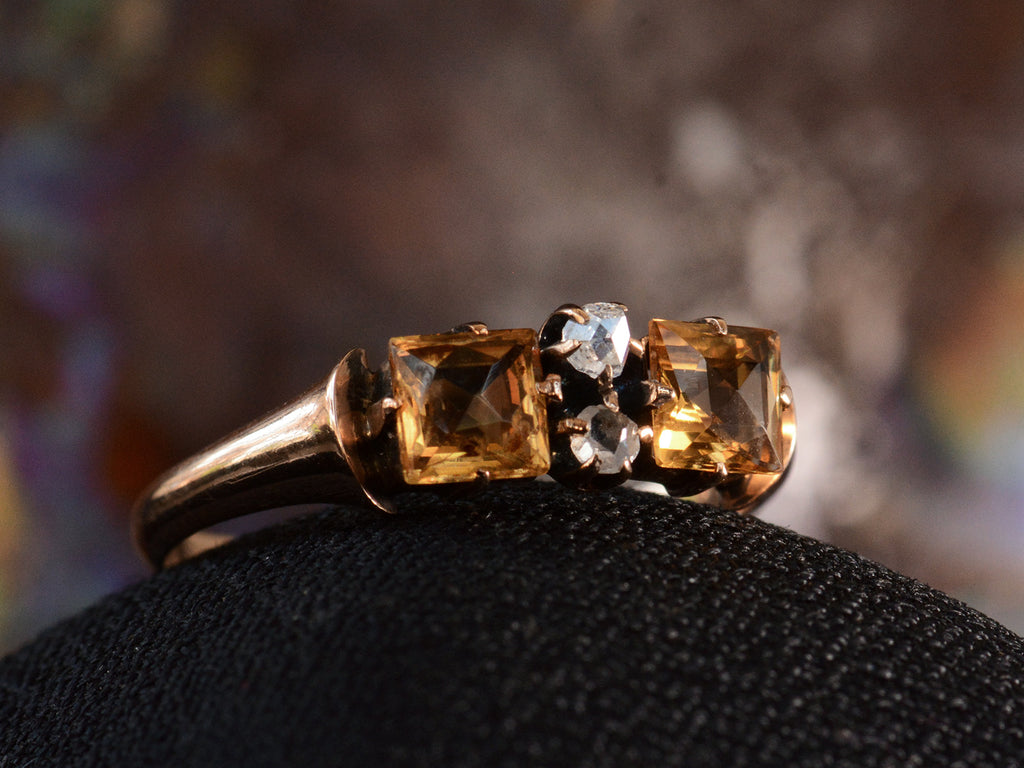 Right angled view of c1900 Citrine & Diamond Ring in Rosy-Yellow Gold (shown on dark background)