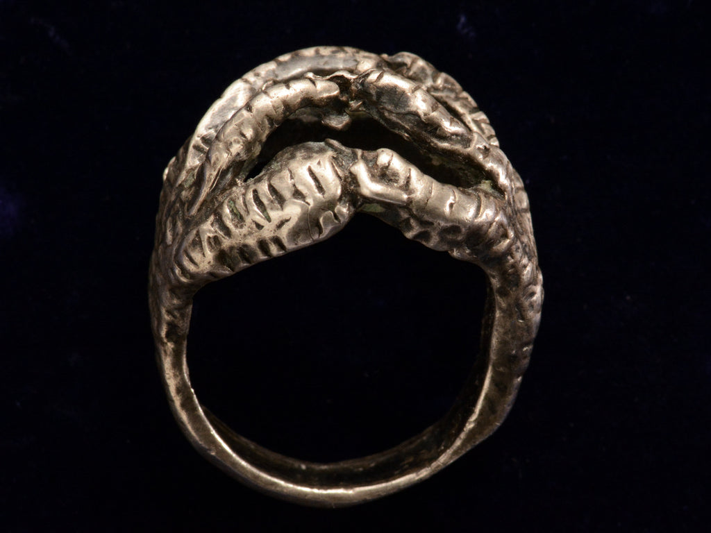 Vintage Silver Bird Claw Ring (side profile on black background)