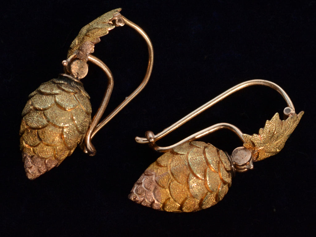 Side profile view of c1880 Victorian Gold Berry Earrings (on black background)