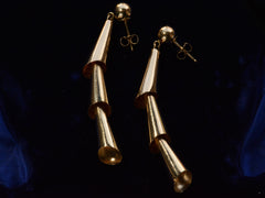 thumbnail of Side angle view of c1980 Articulated Gold Earrings (on dark blue background)