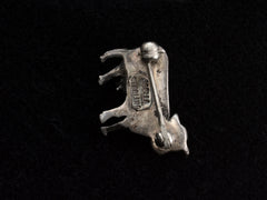 thumbnail of Reverse side of c1980 Tiny Silver Cow Brooch (on black background). Stamped "JOELLA STERLING"