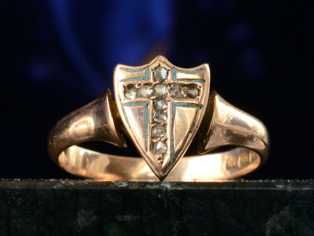 Face on view of c1890 Diamond Cross Ring in Rose Gold (shown on dark blue background)