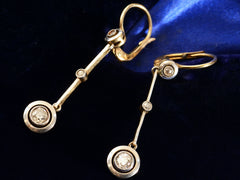 thumbnail of Detail view of c1910 Diamond Drop Earrings in Platinum and 18K yellow gold, shown on dark blue background