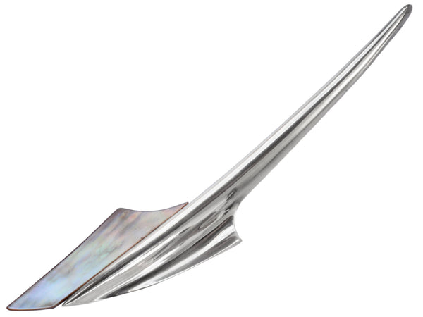 Abstract rocket-ship shaped sterling and abalone brooch on white background.
