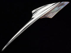 thumbnail of Abstract rocket-ship shaped sterling and abalone brooch on black background, showing abalone iridescence. 