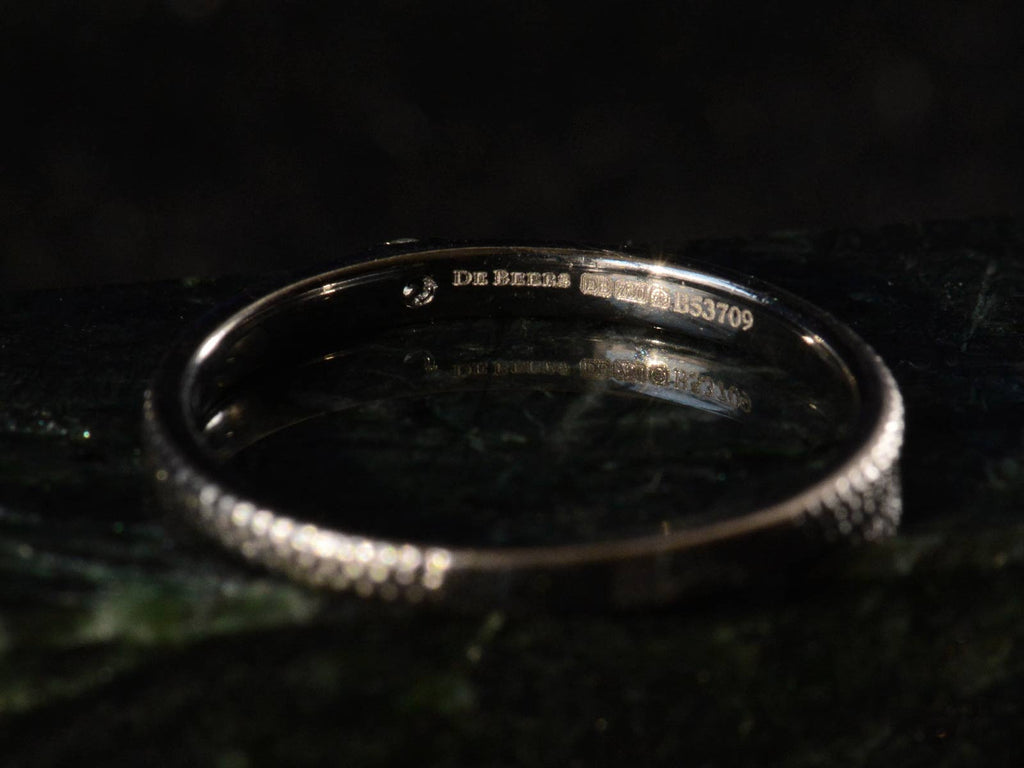 De Beers Talisman Blacked Gold Diamond Band (detail of inside showing stamp that reads "DE BEERS DE 750 B53709)