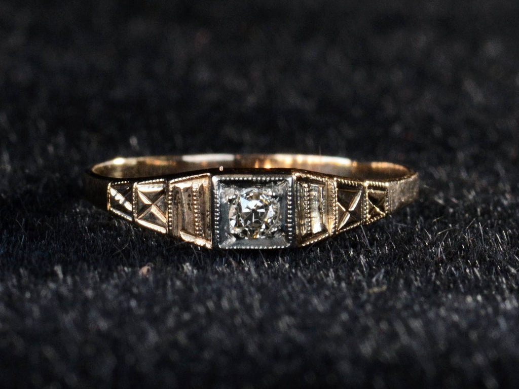 Front view of c1920 Art Deco 0.10ct Yellow and White Gold Engagement Ring (on black background)