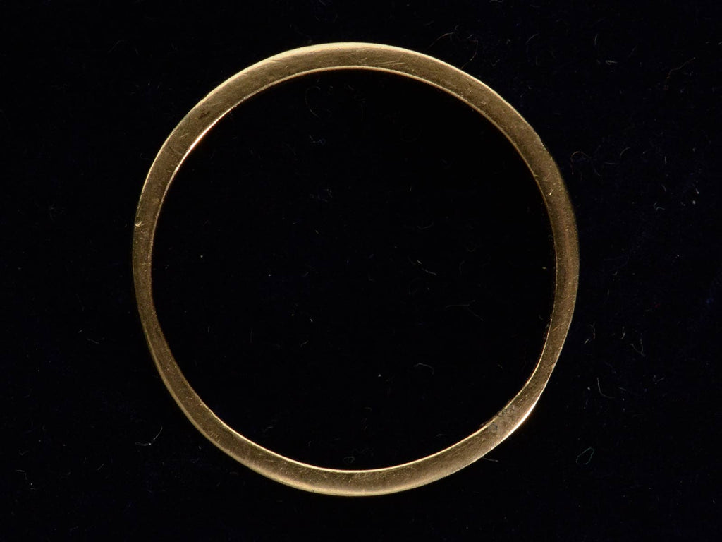 Side profile view of c1890 Patterned Yellow Gold Band (on black background)