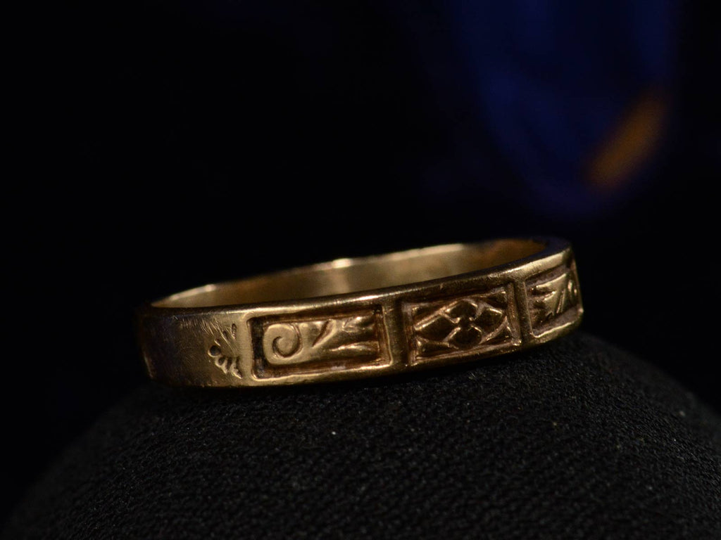 Left angled view of c1890 Patterned Yellow Gold Band (on black background)