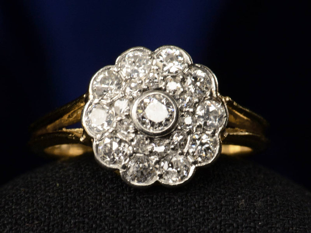 Front view of c1920 Diamond Cluster Ring, 18K Yellow Gold and Platinum (shown on black background)