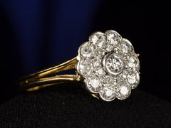 thumbnail of Left angle view of c1920 Diamond Cluster Ring, 18K Yellow Gold and Platinum (shown on black background)