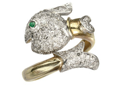 thumbnail of Angled view of emerald-eyed diamond studded fish ring in platinum and yellow gold, shown on white background.