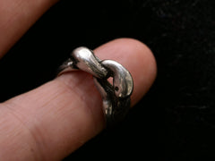 thumbnail of Sterling silver double swan head ring, on finger.