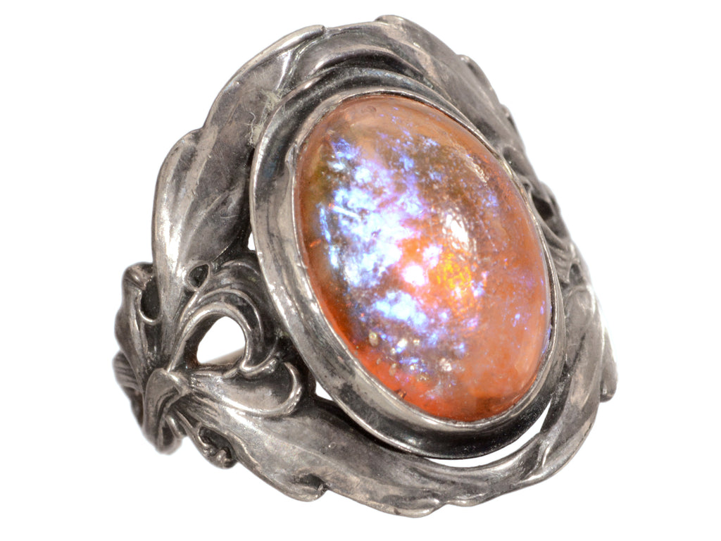 Left side view of c1910 Dragon's Breath Ring (on white background)