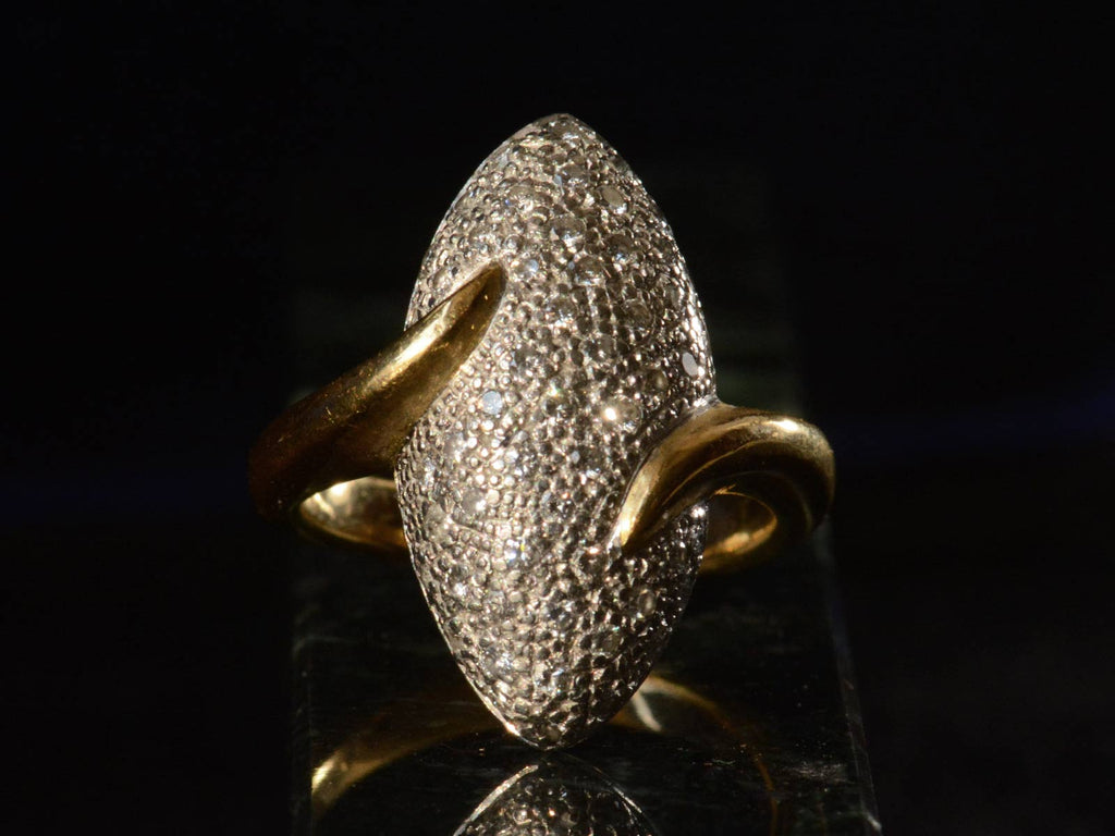 Front view of c1990 Diamond Egg Ring (shown on dark background)