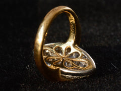 thumbnail of Inside of c1990 Diamond Egg Ring showing filigree design in yellow gold.  A hallmark stamped D050 is visible. Shown on black background.