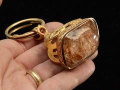 thumbnail of c1890 Massive 18K Fob (bottom side view on hand for scale)