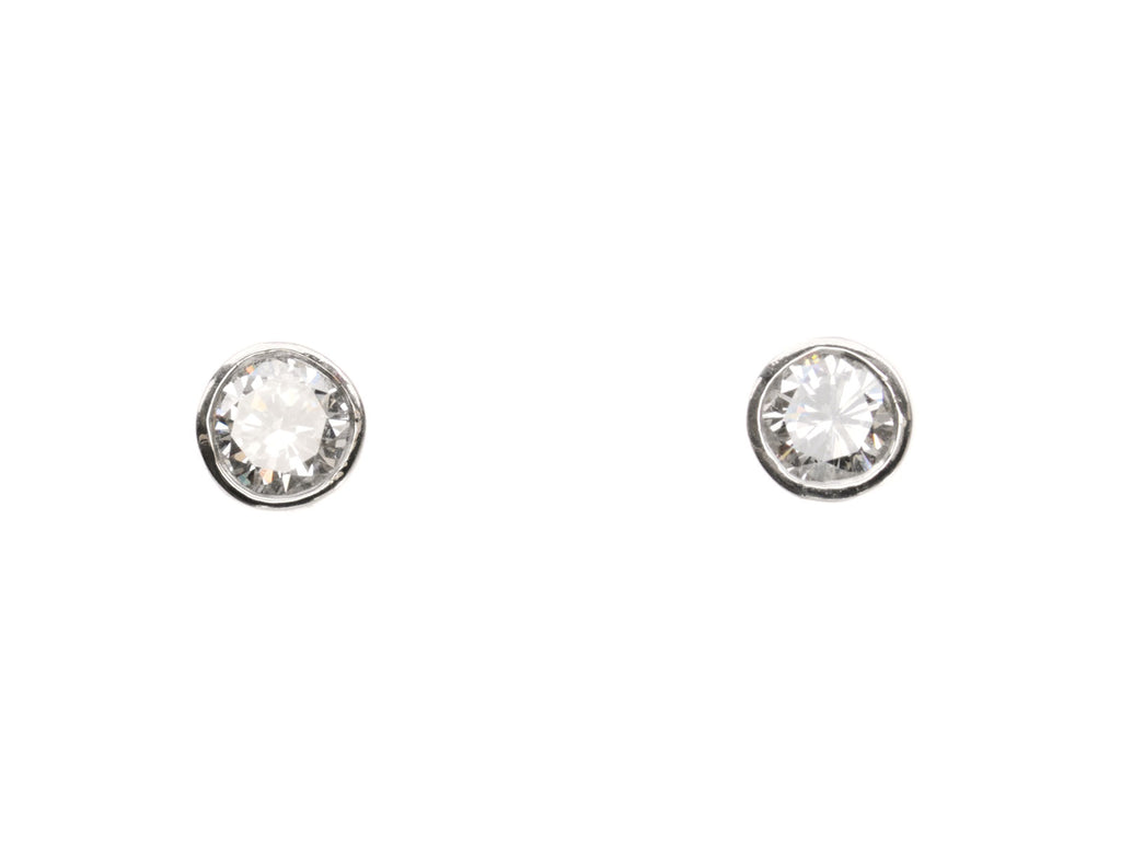 EB 0.14cttw Round Diamond Studs in Platinum Bezels (on white background)