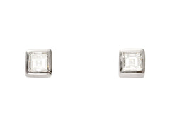 thumbnail of Pair of 0.19cttw square step cut white diamond stud earrings in platinum bezels, shown on white background.