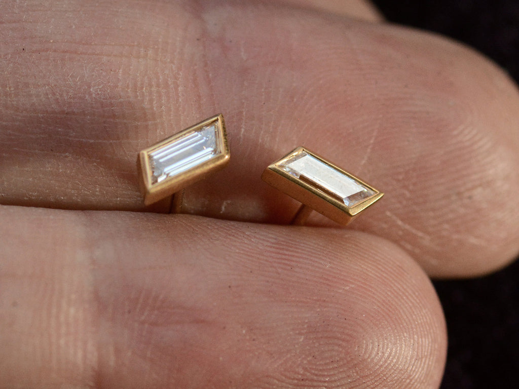 EB 0.40ctw Rhomboid Studs (on finger for scale)