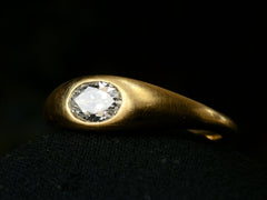 thumbnail of Right angled view of EB Modern engagement ring with a 0.49ct moval diamond flush set in 22K yellow gold (shown on dark background)