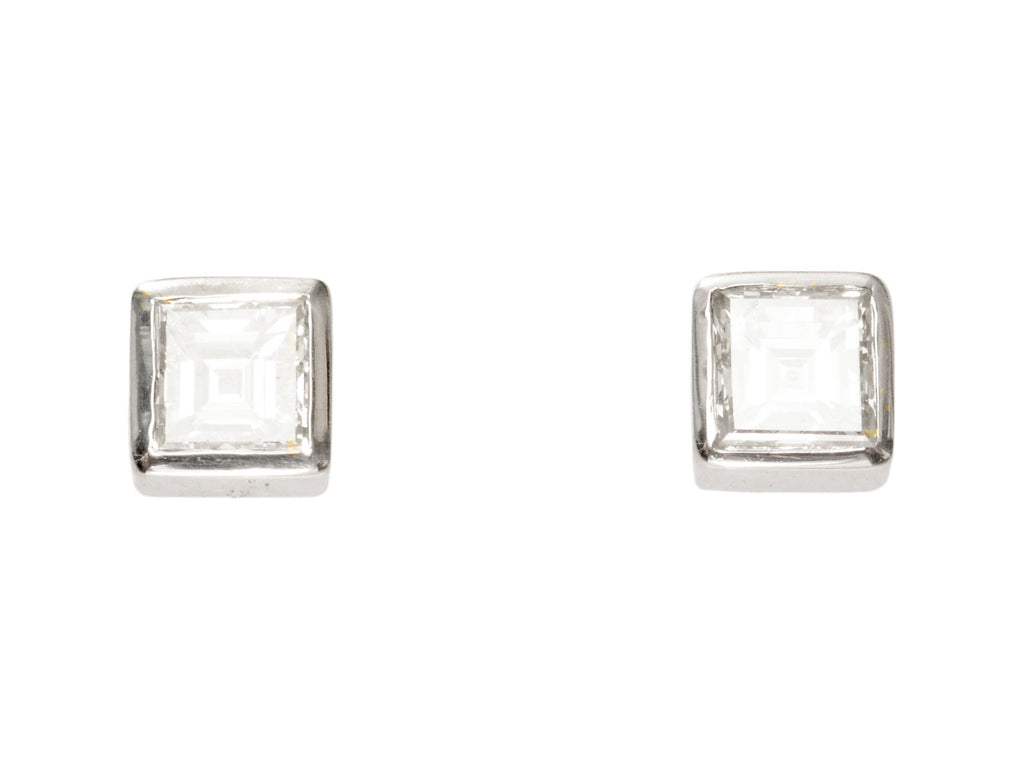 Pair of 0.52cttw Square Step Cut Diamonds Studs in Platinum Bezels (on white background)