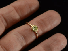 thumbnail of Front of EB Modern engagement ring with 0.59ct Green-Yellow round diamond in yellow gold (on finger)