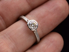 thumbnail of EB Round Step Cut Platinum Ring (on a finger for scale)