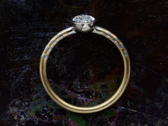 thumbnail of Side profile view of EB 0.69ct Oval Diamond Ring with Platinum Bezel and Striped Gold and Platinum Band (shown on dark background)