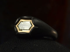 thumbnail of Right angled view of EB Modern hexagonal light yellow diamond set in yellow gold bezel sunken into pillowy blackened silver mounting (shown on dark background)
