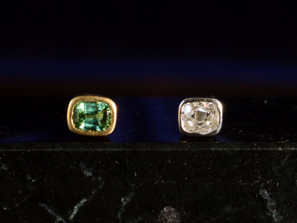  Mismatched EB Modern Diamond and Green Sapphire Stud Earrings (front view on black background))