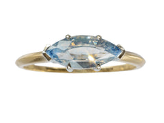 thumbnail of EB Modern ring with marquise-shaped light blue sapphire set in a simple platinum topped yellow gold mounting, shown on white background.