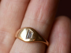 thumbnail of EB 0.29ct Trapezoid Ring (on finger for scale)