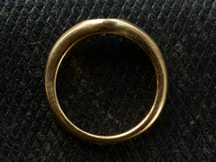 thumbnail of Side profile of vintage Tiffany & Co Elsa Peretti ring in yellow gold shown on dark textured leather background.