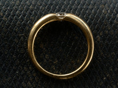 thumbnail of Alternate side profile of vintage Tiffany & Co Elsa Peretti diamond ring in yellow gold shown on dark textured leather background.