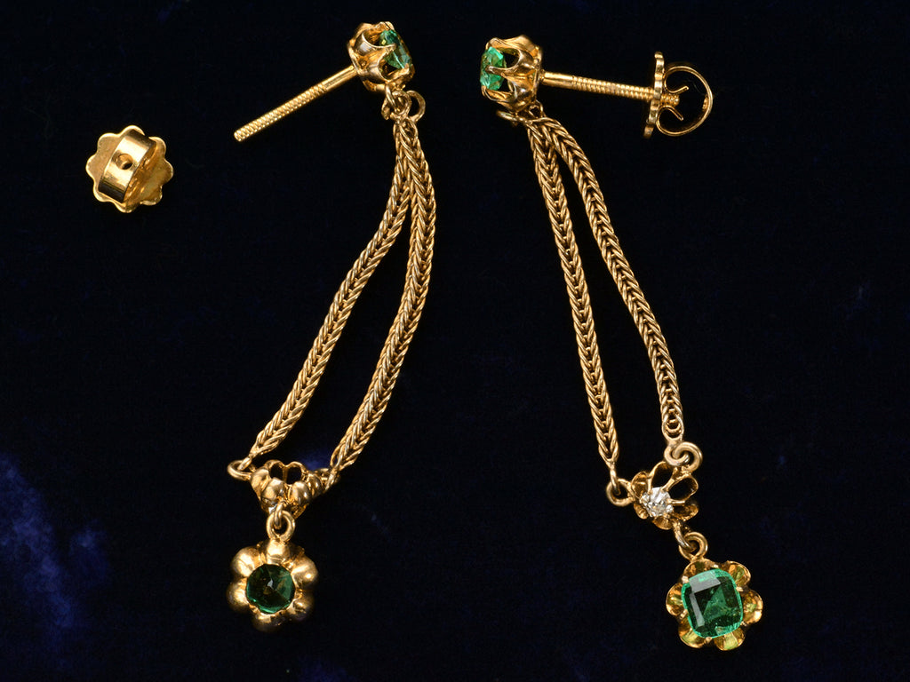 c1900 Emerald and Diamond Drop Earrings in Yellow Gold (detail showing fittings on black background)