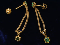 thumbnail of c1900 Emerald and Diamond Drop Earrings in Yellow Gold (detail showing fittings on black background)