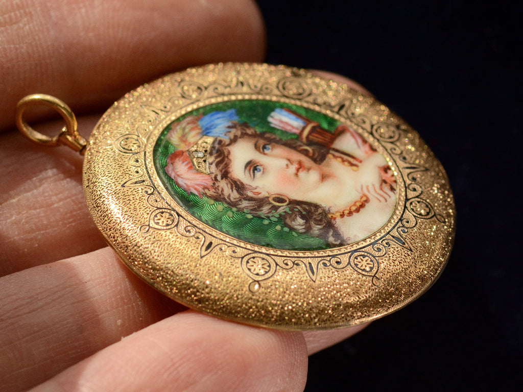 Angled View of c1870 Enamel Goddess Pendant (on hand for scale)