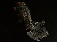 thumbnail of Top view of vintage c1950 Chinese articulated fish pendant with orange enamel and filigree, shown on dark background.