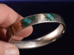 thumbnail of Angled view of c1890 Victorian Silver Bracelet with Blue Enamel Forget Me Not Flowers (shown on in hand for scale)
