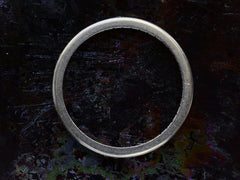 thumbnail of Side profile of a thin vintage diamond eternity band in platinum, shown on dark background