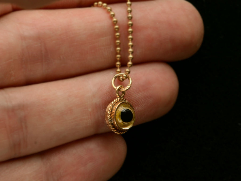 c1970 Evil Eye Charm Necklace (on hand for scale)