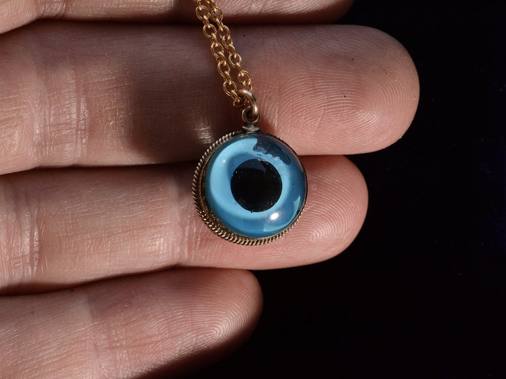 c1950 Evil Eye Pendant (on hand for scale)