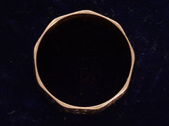 thumbnail of Side profile view of c1880 Faceted Cigar Band in Rose Gold (shown on dark background)