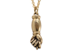 thumbnail of Vintage gold hand-shaped figa pendant on a chain against a white background