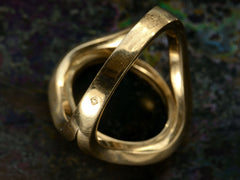 thumbnail of Shank detail view of a vintage French yellow gold signet ring focused on the French makers mark with the letters J and B stamped on either side of a hut symbol.